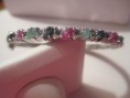 Emerald, sapphire and ruby sterling silver bangle bracelet